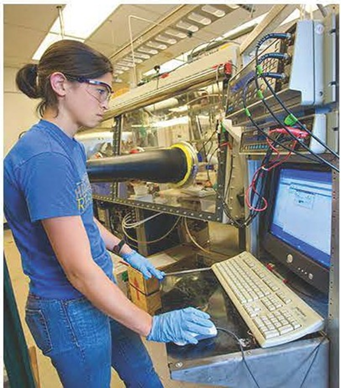 LBNL Postdoctoral Fellow shown performing diagnostic methods